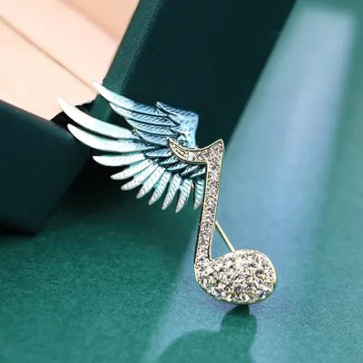 Trendy Wings Music Note Brooch